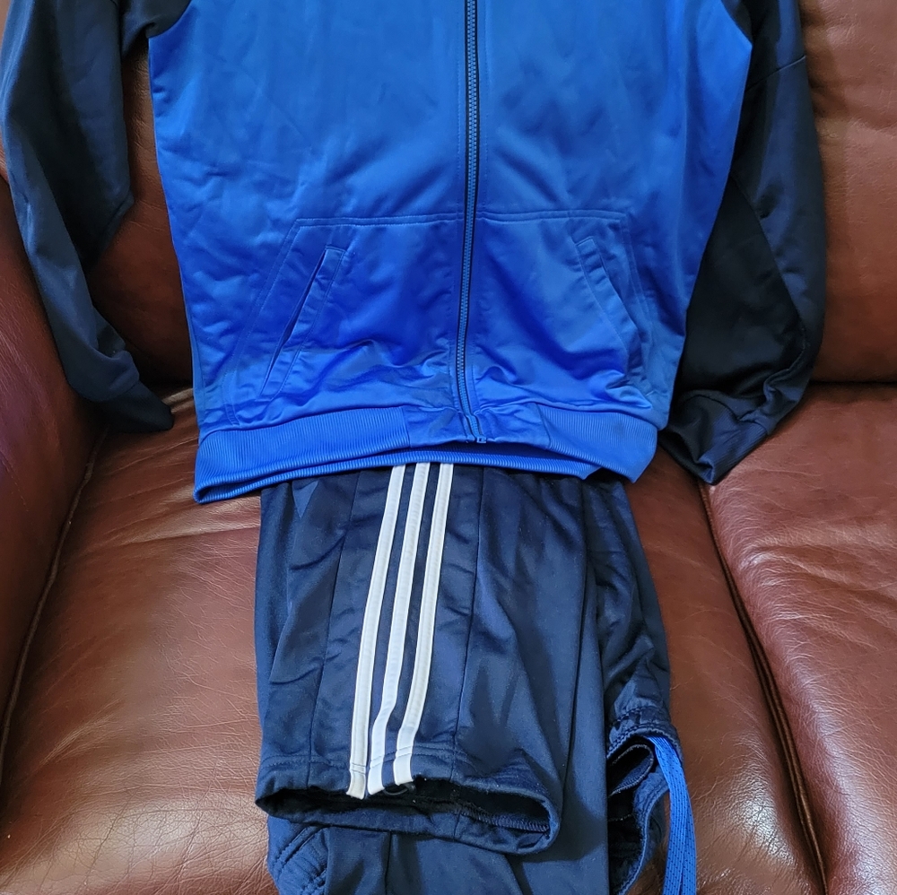 Men's Adidas track pants and jacket.